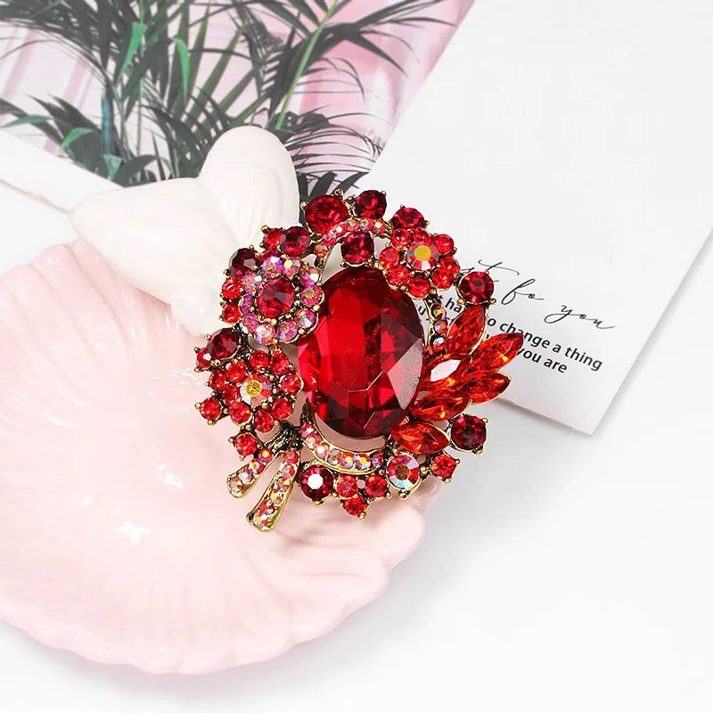 Red rhinestone brooch