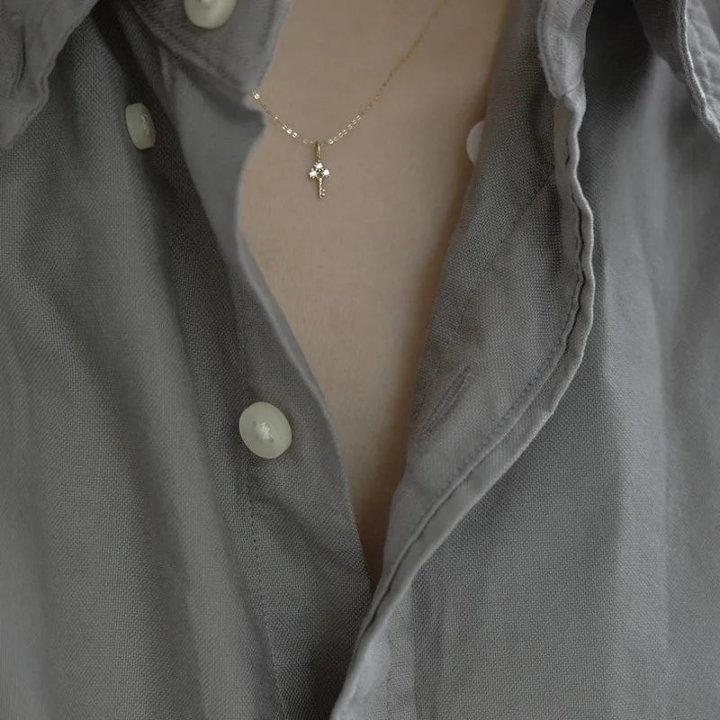 Gold necklace with key