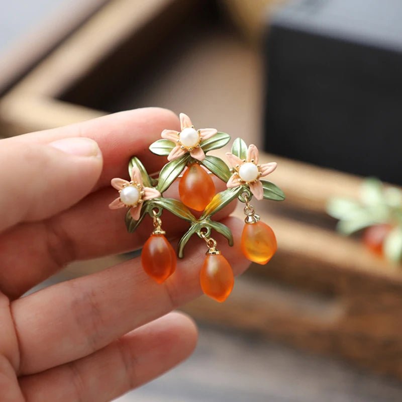Orange brooch - Jewelry Universe