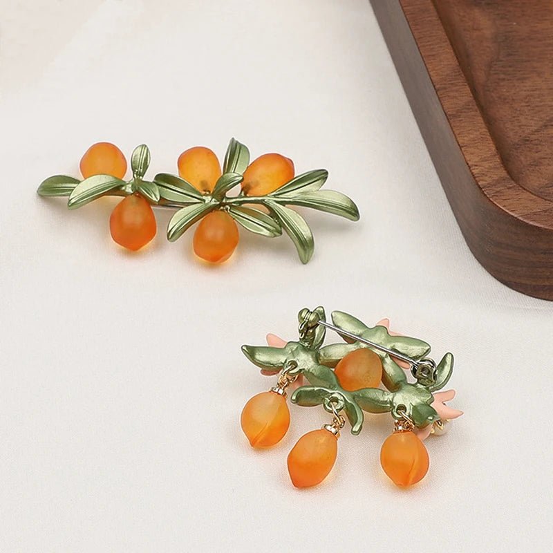 Orange brooch - Jewelry Universe