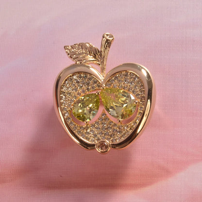 Apple brooch