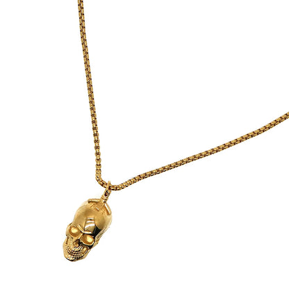 Gold skull pendant