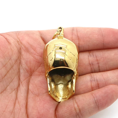 Gold skull pendant