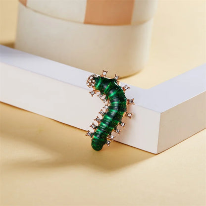 Caterpillar brooch