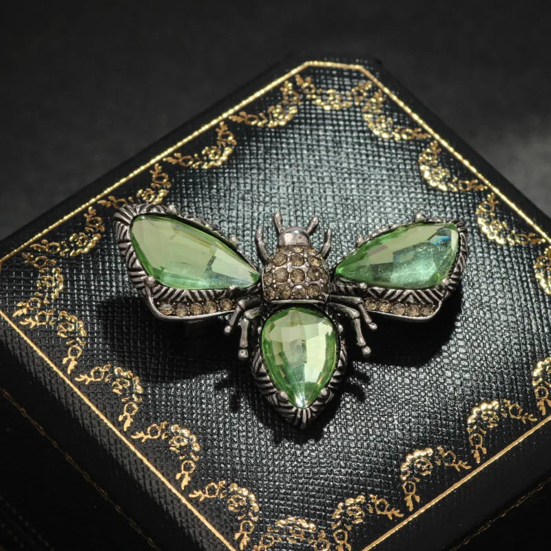 Antique bug brooches