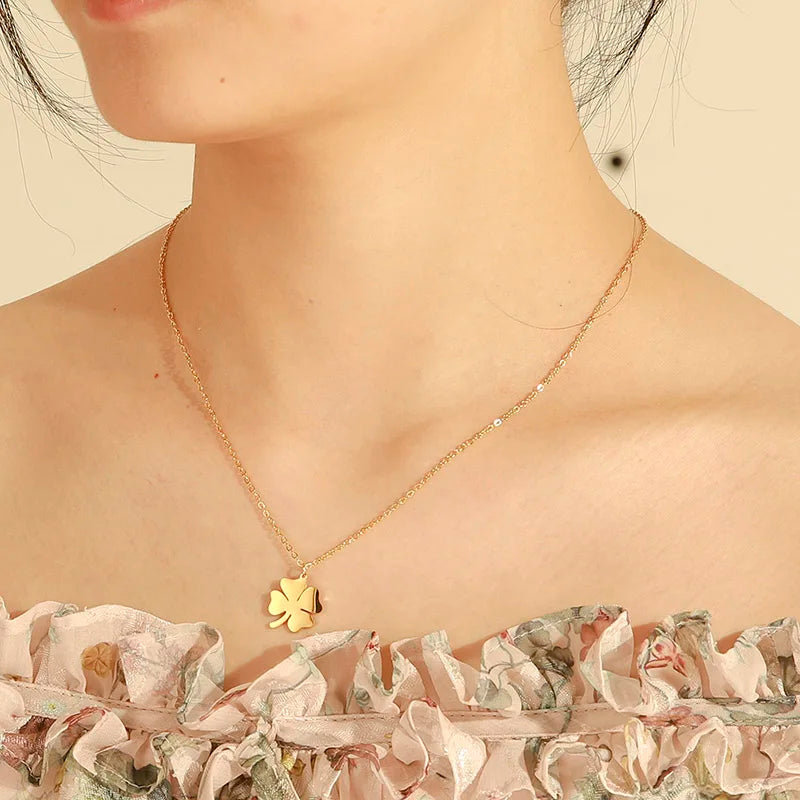 Gold four leaf clover necklace