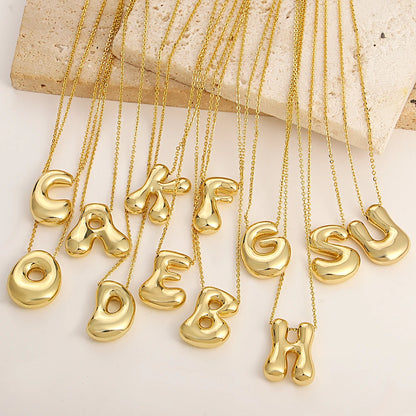 Bubble letter necklace gold