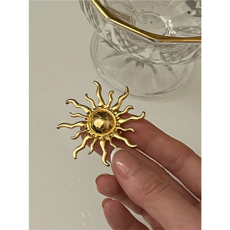 Sun brooch