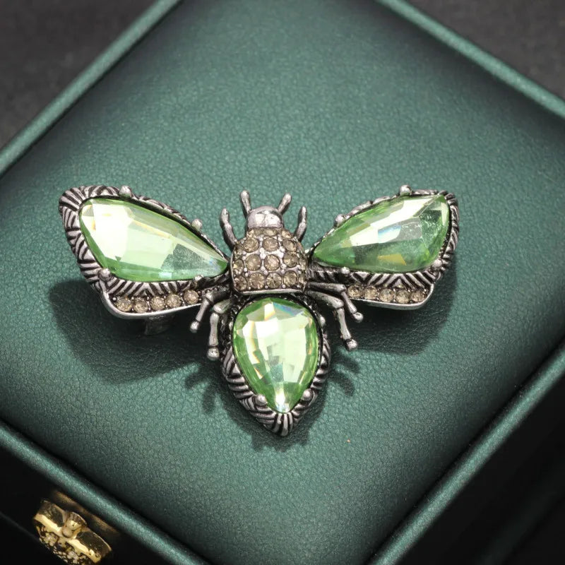 Antique bug brooches