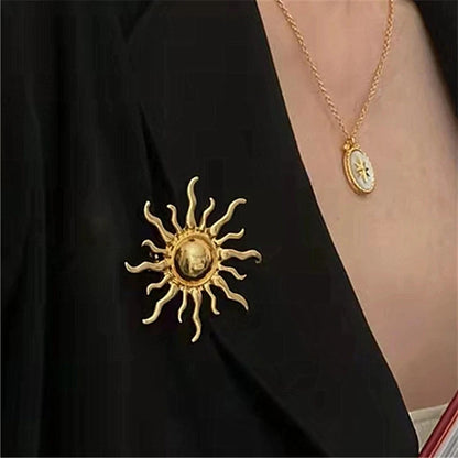 Sun brooch