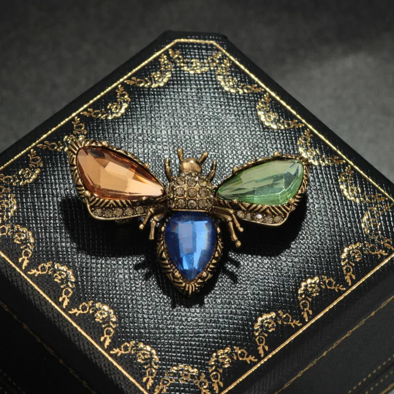 Antique bug brooches