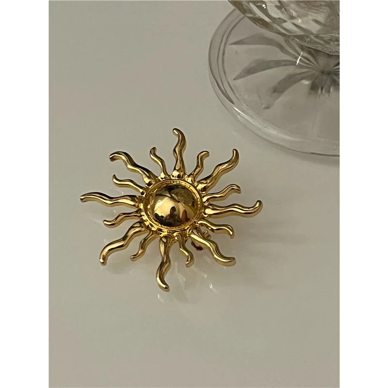 Sun brooch