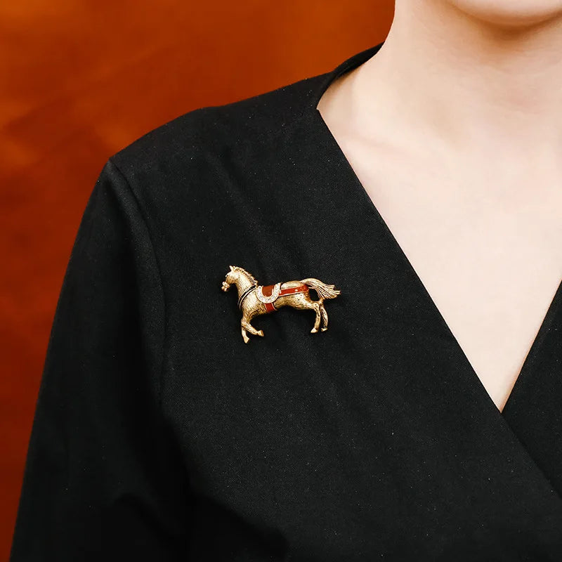 Horse brooches and pins