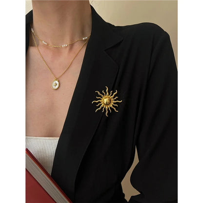 Sun brooch