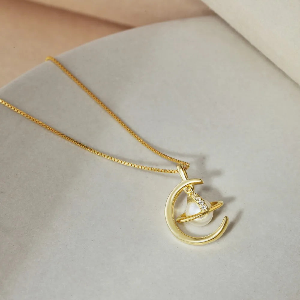 Saturn pearl necklace