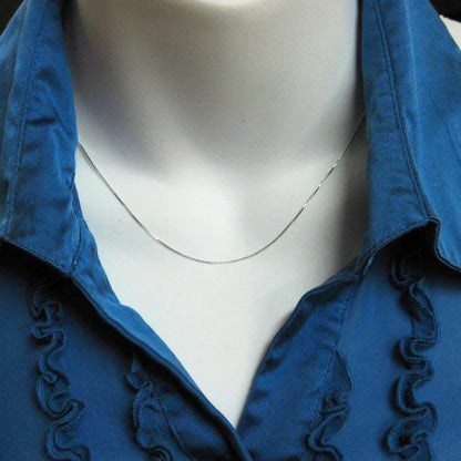 Thin gold chain necklace