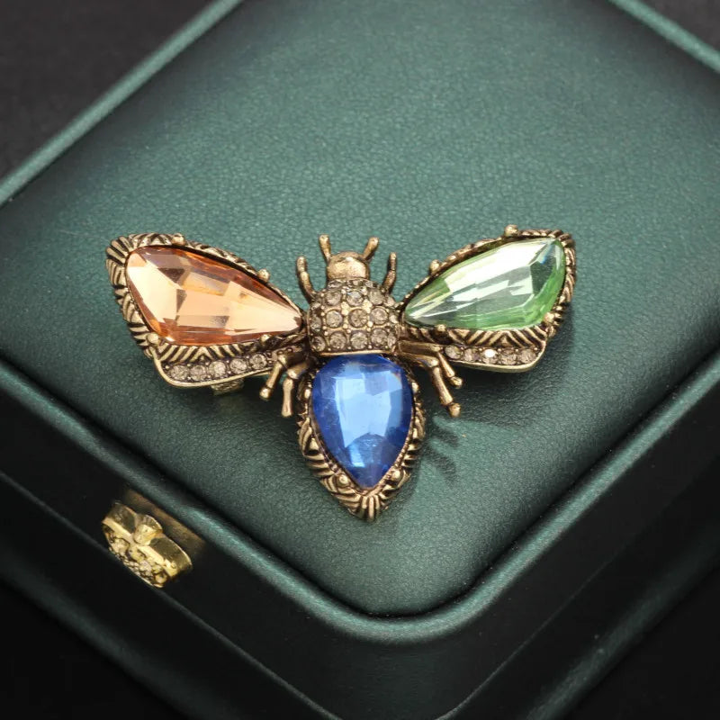 Antique bug brooches