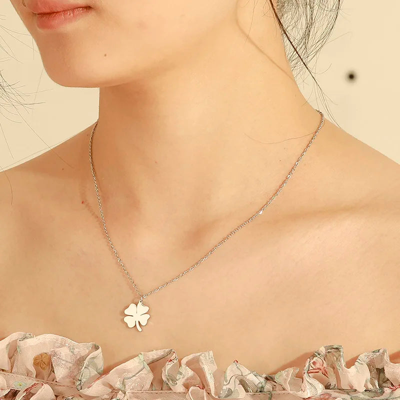 Gold four leaf clover necklace