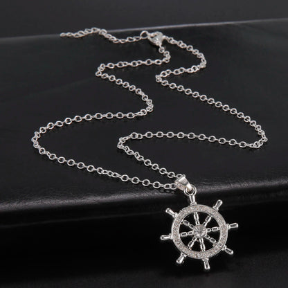 Dharma wheel pendant