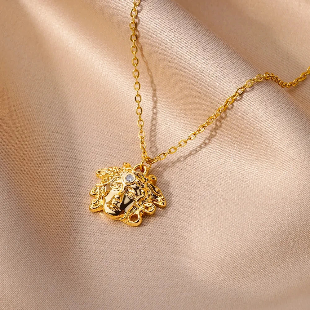 Gold medusa pendant